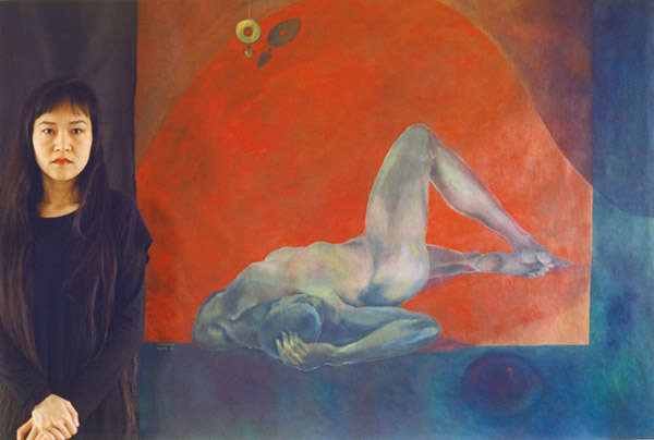 Minhquang Nguyen with her painting.